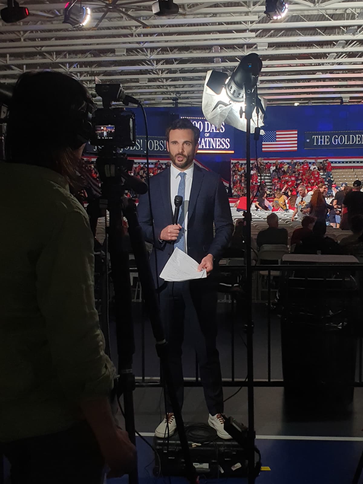 BBC News Correspondent Carl Nasman reporting from Trump's 100 days rally