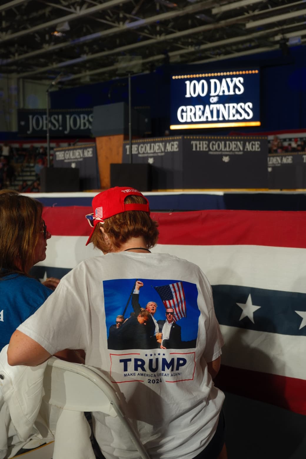 A Trump supporter sat in the front row of his 100 days rally